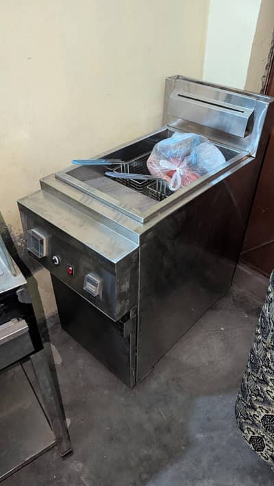 fryer and counter with accessories