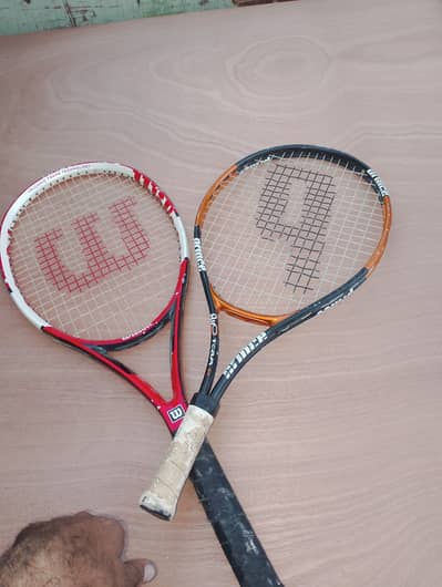 2 Tennis Rackets For Sale • Wilson red/white racket