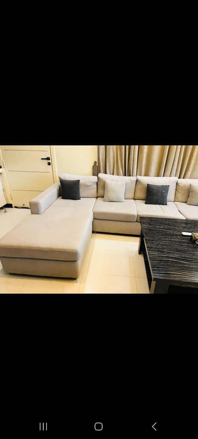 10 seatr L shape sofa. . . brand poshish