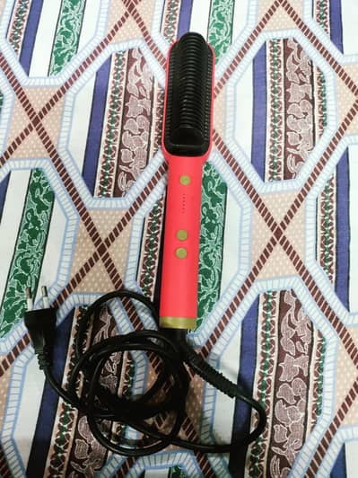 hair straightener comb. . .