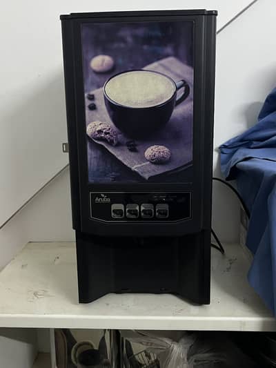 Coffee and tea vending machine