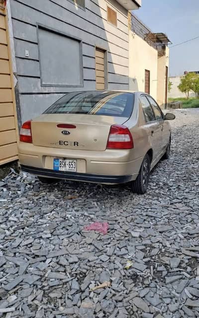 KIA Spectra 2002 btr than (suzuki liana,mehran,alto vxr,cultus vxl)