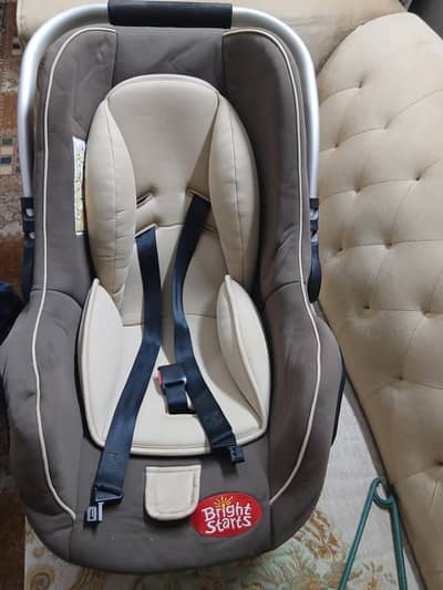 Bright starts Baby car seat/carry cot_ Like new (used twice only)