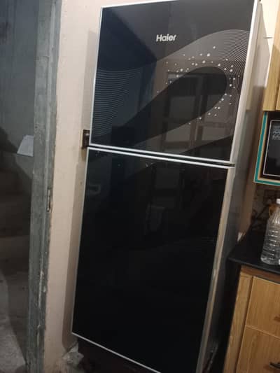 Haier fridge 10 year old model front door Thora hrab hay