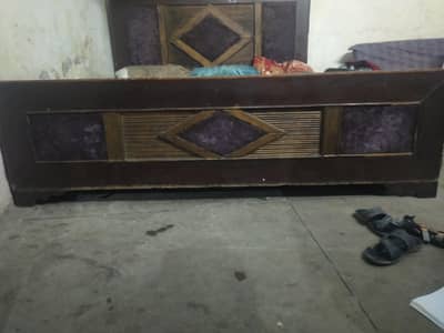 wooden bed with metress