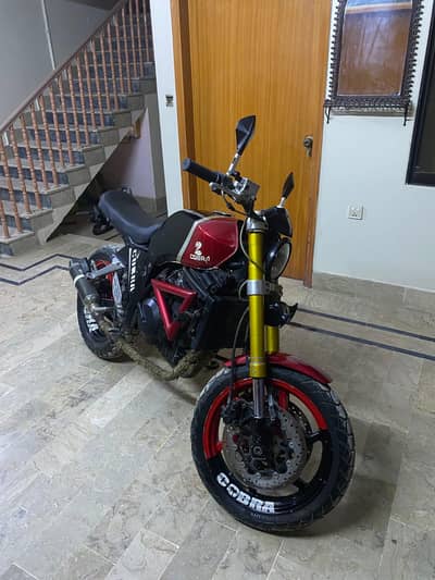 Chasis : Suzuki 150.  Engine: Kawasaki 250