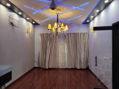 10 marla modern full house with 2 kitchens available for rent facing park in phase 5 L block DHA Lahore