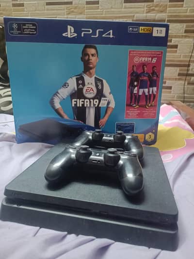 PS4 Slim 1tb with 2 controllers + games installed