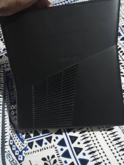 Xbox 360 slim game in still warranty