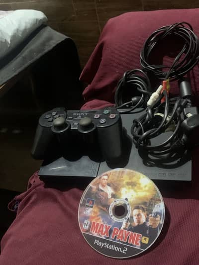 Ps2 all okay with one game WhatsApp 03174642669