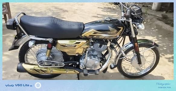 Honda 125 brand new scratless 804 golden number lga ha