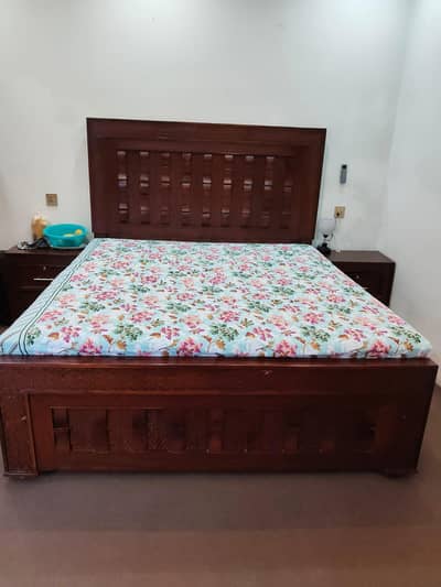A beautiful king size bed with side tables