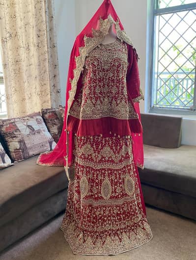Luxury Red Bridal Lehenga with Heavy Gold Embroidery