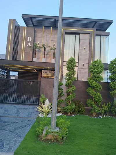SYED BROTHERS PROUDLY OFFERS: 1-Kanal Elegant And Fully Maintained Modern Bungalow Is Available In The Best Block Of DHA Lahore.