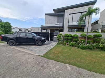 SYED BROTHERS PROUDLY OFFERS: 1-Kanal Elegant And Fully Maintained 2 Years Old Bungalow with Cinema Is Available In The Best Block Of DHA Lahore.