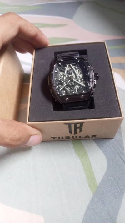 man's tubular watch