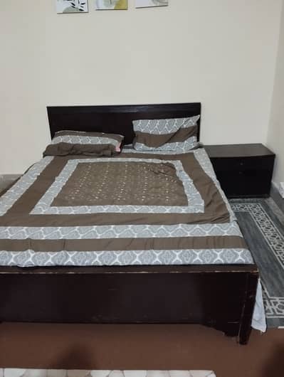 Queen size bed with side table 