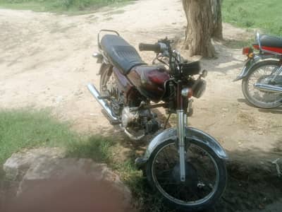 Honda 70 8 model used condition. enjin good condition