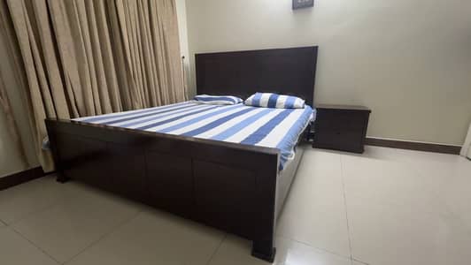 Bed with two side tables