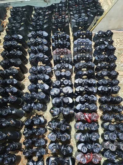 Big Collection of Binoculars for Safari and Hunting