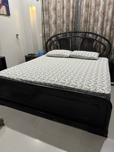 Kind size wooden bed with side tables