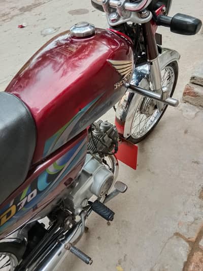 Honda 70 23/24 Total genuine