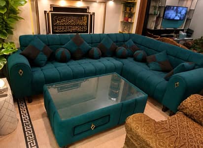 Teal Green L shaped sofa with bubbled design