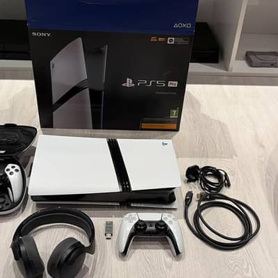 PS5 pro 2 controllers disc drive with box 5 game urgent sale