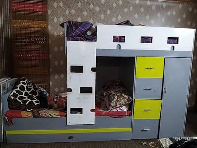 Bunk bed with extra bed space made with good quality wood
