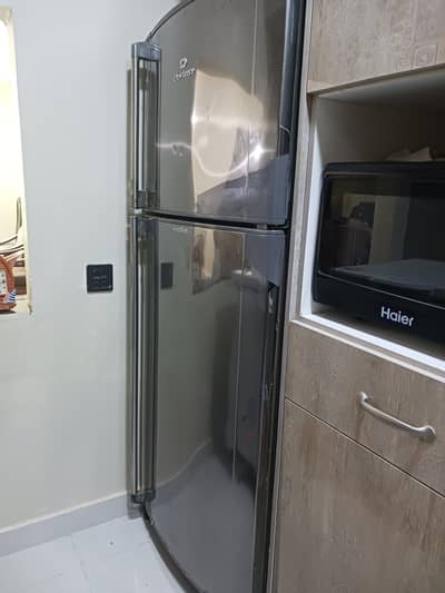 Urgent Full size fridge