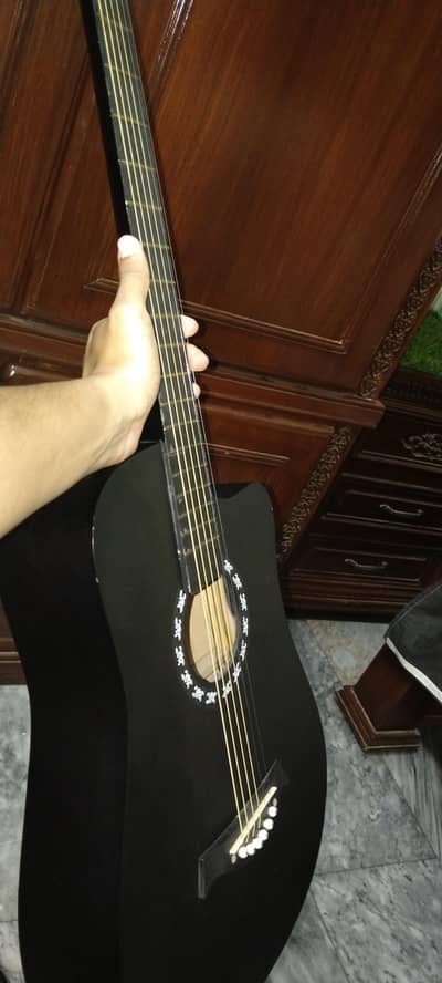 Black Accoustic guitar
