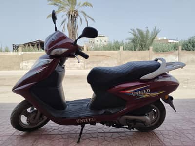 united scooty 100cc