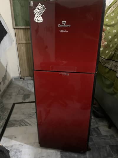 A refrigerator with little bit damage