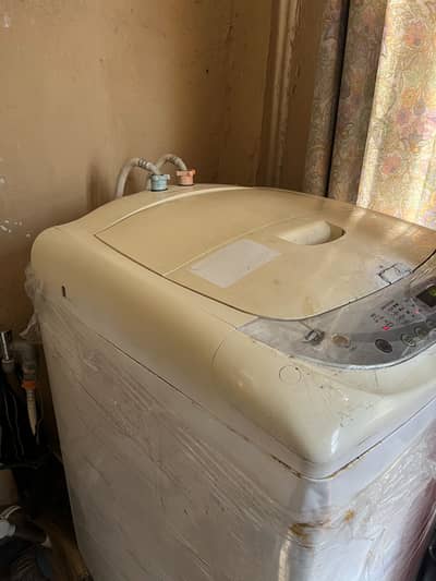 LG Fuzzy Logic Fully Automatic Top Load Washing Machine