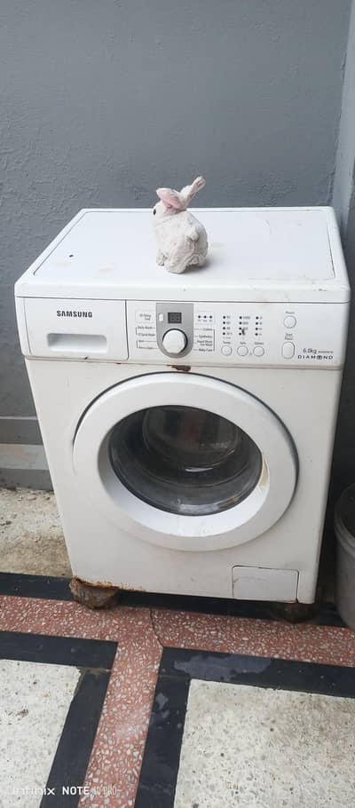 washing machine urgent sale.     ismein thoda ishu hai
