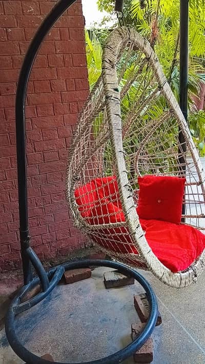 Swing with cushions