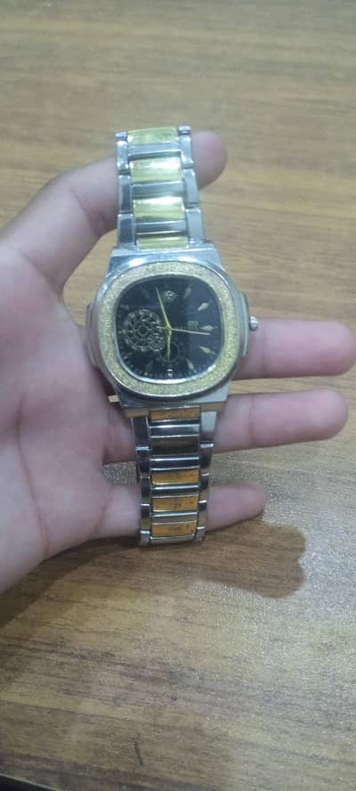 white and golden watch