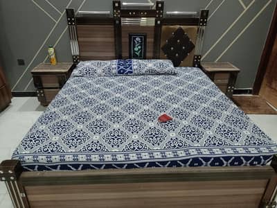 double size wooden bed with 2 side tables with out mattress andDressor