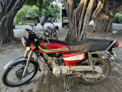 Honda 125 total genuine good condition  1st owner