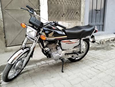 125 self start silver edition