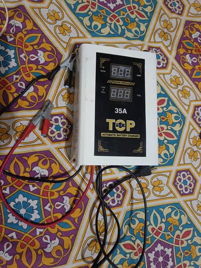 Battery charger top v battery