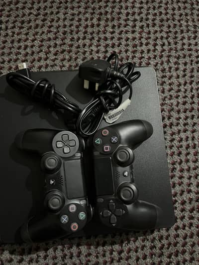 Ps4 slim with 2 controllers with 1 game taken 7