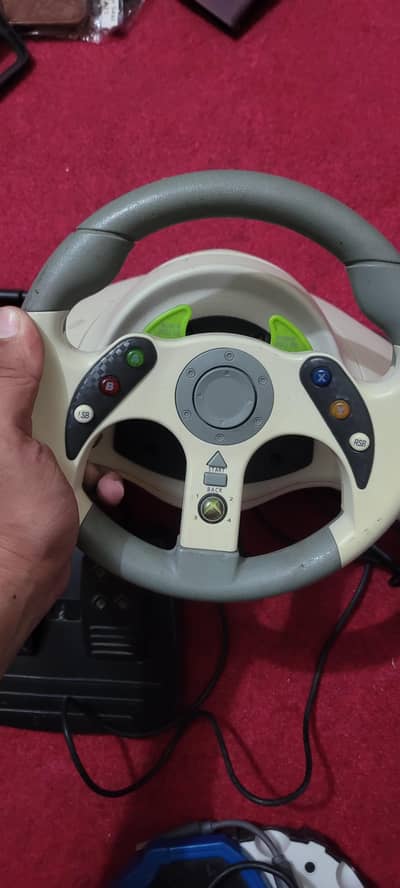 Xbox 360 steering wheel controller available for sale