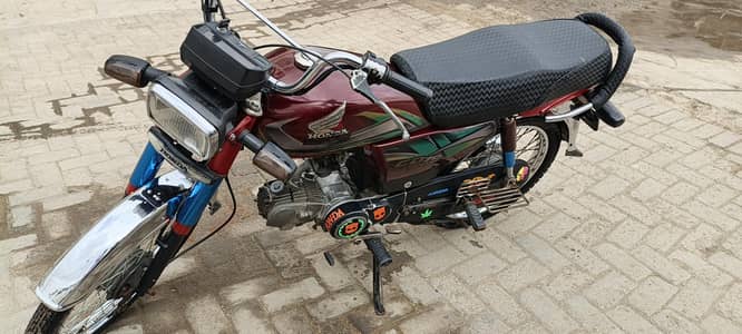 Honda 70 CD 2022 model. red colour