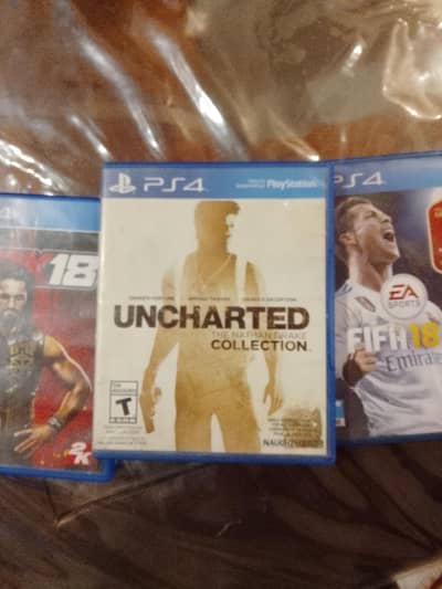 ps4 CDs, uncharted Nathan Drake collection, wwe2k18 fifa 18