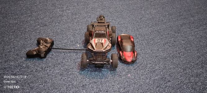 2 Remote control cars with single remote
