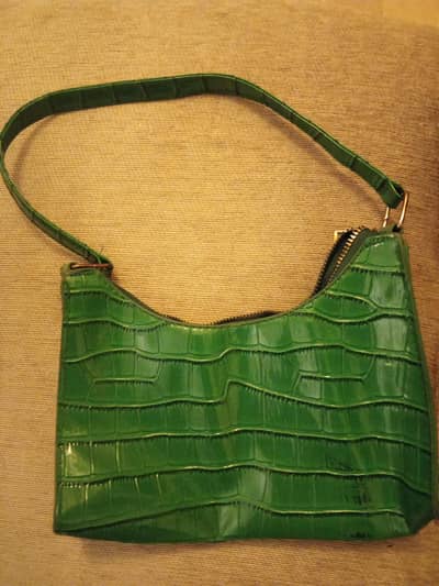 green leather bag