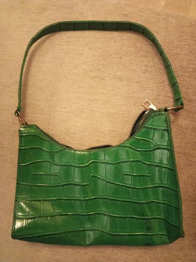 green leather bag