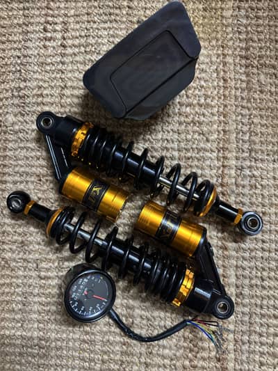 Tripple performance shoks ,meter,back light (multi lights,indicators)