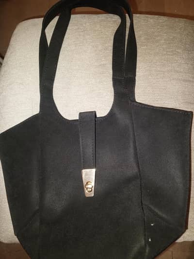 black leather medium sized shoulder bag
